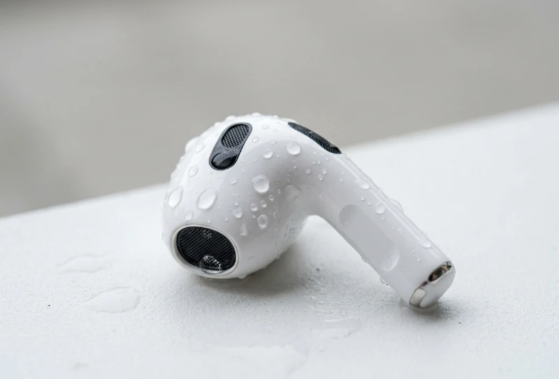 Water Eject AirPods: Fix Muffled Sound in 2 Minutes (Free Method) 1 water eject airpods with visible water droplets on speaker